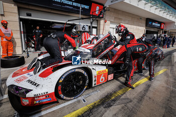 2024-03-02 - 06 ESTRE Kevin (fra), LOTTERER André (ger), VANTHOOR Laurens (bel), Porsche Penske Motorsport, Porsche 963 #06, Hypercar, stand, pit lane, during the Qatar Airways Qatar 1812 KM, 1st round of the 2024 FIA World Endurance Championship, from February 29 to March 02, 2024 on the Losail International Circuit in Lusail, Qatar - FIA WEC - QATAR AIRWAYS QATAR 1812 KM - ENDURANCE - MOTORS