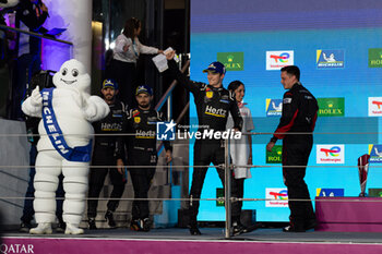 2024-03-02 - 12 STEVENS Will (gbr), NATO Norman (fra), ILOTT Callum (gbr), Hertz Team Jota, Porsche 963 #12, Hypercar, podium during the Qatar Airways Qatar 1812 KM, 1st round of the 2024 FIA World Endurance Championship, from February 29 to March 02, 2024 on the Losail International Circuit in Lusail, Qatar - FIA WEC - QATAR AIRWAYS QATAR 1812 KM - ENDURANCE - MOTORS