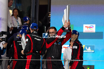 2024-03-02 - 06 ESTRE Kevin (fra), LOTTERER André (ger), VANTHOOR Laurens (bel), Porsche Penske Motorsport, Porsche 963 #06, Hypercar, podium during the Qatar Airways Qatar 1812 KM, 1st round of the 2024 FIA World Endurance Championship, from February 29 to March 02, 2024 on the Losail International Circuit in Lusail, Qatar - FIA WEC - QATAR AIRWAYS QATAR 1812 KM - ENDURANCE - MOTORS