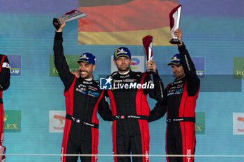 2024-03-02 - 05 CAMPBELL Matt (aus), CHRISTENSEN Michael (dnk), MAKOWIECKI Frédéric (fra), Porsche Penske Motorsport, Porsche 963 #05, Hypercar, podium during the Qatar Airways Qatar 1812 KM, 1st round of the 2024 FIA World Endurance Championship, from February 29 to March 02, 2024 on the Losail International Circuit in Lusail, Qatar - FIA WEC - QATAR AIRWAYS QATAR 1812 KM - ENDURANCE - MOTORS