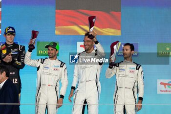 2024-03-02 - 99 TINCKNELL Harry (gbr), JANI Neel (swi), ANDLAUER Julien (fra), Proton Competition, Porsche 963 #99, Hypercar, podium during the Qatar Airways Qatar 1812 KM, 1st round of the 2024 FIA World Endurance Championship, from February 29 to March 02, 2024 on the Losail International Circuit in Lusail, Qatar - FIA WEC - QATAR AIRWAYS QATAR 1812 KM - ENDURANCE - MOTORS