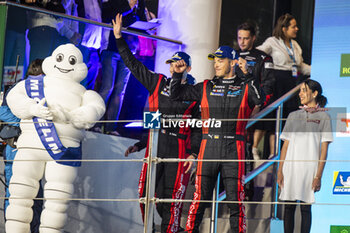 2024-03-02 - LOTTERER André (ger), Porsche Penske Motorsport, Porsche 936, podium, portrait during the Qatar Airways Qatar 1812 KM, 1st round of the 2024 FIA World Endurance Championship, from February 29 to March 02, 2024 on the Losail International Circuit in Lusail, Qatar - FIA WEC - QATAR AIRWAYS QATAR 1812 KM - ENDURANCE - MOTORS