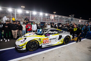 2024-03-02 - 92 MALYKHIN Aliaksandr (kna), STURM Joel (ger), BACHLER Klaus (aut), Manthey Purerxcing, Porsche 911 GT3 R #91, LM GT3, finish line, arrivee, during the Qatar Airways Qatar 1812 KM, 1st round of the 2024 FIA World Endurance Championship, from February 29 to March 02, 2024 on the Losail International Circuit in Lusail, Qatar - FIA WEC - QATAR AIRWAYS QATAR 1812 KM - ENDURANCE - MOTORS