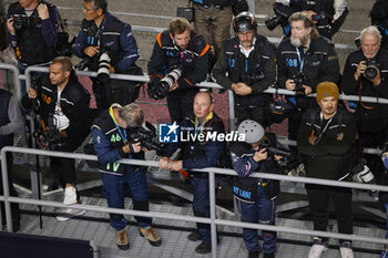 2024-03-02 - Frederic Le Floc'h Germain Hazard DPPI photographer in podium during the Qatar Airways Qatar 1812 KM, 1st round of the 2024 FIA World Endurance Championship, from February 29 to March 02, 2024 on the Losail International Circuit in Lusail, Qatar - FIA WEC - QATAR AIRWAYS QATAR 1812 KM - ENDURANCE - MOTORS