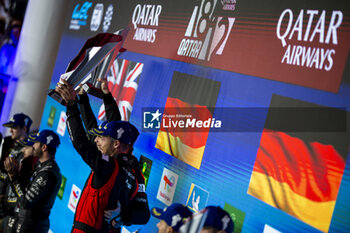 2024-03-02 - LOTTERER André (ger), Porsche Penske Motorsport, Porsche 936, podium, portrait during the Qatar Airways Qatar 1812 KM, 1st round of the 2024 FIA World Endurance Championship, from February 29 to March 02, 2024 on the Losail International Circuit in Lusail, Qatar - FIA WEC - QATAR AIRWAYS QATAR 1812 KM - ENDURANCE - MOTORS