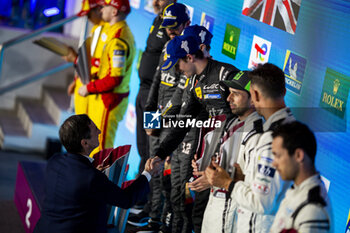 2024-03-02 - ILOTT Callum (gbr), Hertz Team Jota, Porsche 963, podium, portrait during the Qatar Airways Qatar 1812 KM, 1st round of the 2024 FIA World Endurance Championship, from February 29 to March 02, 2024 on the Losail International Circuit in Lusail, Qatar - FIA WEC - QATAR AIRWAYS QATAR 1812 KM - ENDURANCE - MOTORS