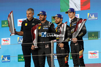 2024-03-02 - 12 STEVENS Will (gbr), NATO Norman (fra), ILOTT Callum (gbr), Hertz Team Jota, Porsche 963 #12, Hypercar, podium, portrait, during the Qatar Airways Qatar 1812 KM, 1st round of the 2024 FIA World Endurance Championship, from February 29 to March 02, 2024 on the Losail International Circuit in Lusail, Qatar - FIA WEC - QATAR AIRWAYS QATAR 1812 KM - ENDURANCE - MOTORS