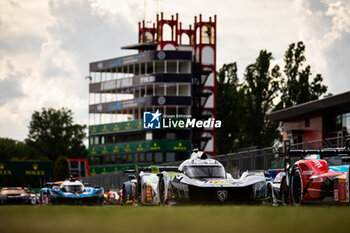 2024-04-17 - 93 JENSEN Mikkel (dnk), MULLER Nico (swi), VERGNE Jean-Eric (fra), Peugeot TotalEnergies, Peugeot 9x8 #93, Hypercar, family picture set up during the 2024 6 Hours of Imola, 2nd round of the 2024 FIA World Endurance Championship, from April 18 to 21, 2024 on the Autodromo Internazionale Enzo e Dino Ferrari in Imola, Qatar - FIA WEC - 6 HOURS OF IMOLA 2024 - ENDURANCE - MOTORS