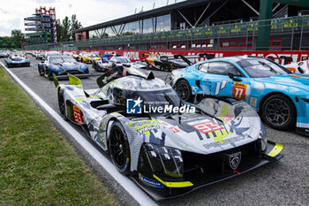 2024-04-17 - 93 JENSEN Mikkel (dnk), MULLER Nico (swi), VERGNE Jean-Eric (fra), Peugeot TotalEnergies, Peugeot 9x8 #93, Hypercar, ambiance at family picture during the 2024 6 Hours of Imola, 2nd round of the 2024 FIA World Endurance Championship, from April 18 to 21, 2024 on the Autodromo Internazionale Enzo e Dino Ferrari in Imola, Qatar - FIA WEC - 6 HOURS OF IMOLA 2024 - ENDURANCE - MOTORS