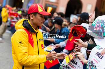 2024-04-18 - YE Yifei (chn), AF Corse, Ferrari 499P, portrait, parade Imola city center during the 2024 6 Hours of Imola, 2nd round of the 2024 FIA World Endurance Championship, from April 18 to 21, 2024 on the Autodromo Internazionale Enzo e Dino Ferrari in Imola, Qatar - FIA WEC - 6 HOURS OF IMOLA 2024 - ENDURANCE - MOTORS