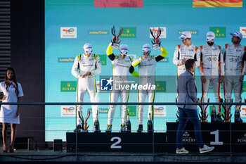 2024-05-11 - 92 MALYKHIN Aliaksandr (kna), STURM Joel (ger), BACHLER Klaus (aut), Manthey Purerxcing, Porsche 911 GT3 R #91, LM GT3, podium during the 2024 TotalEnergies 6 Hours of Spa-Francorchamps, 3rd round of the 2024 FIA World Endurance Championship, from May 8 to 11, 2024 on the Circuit de Spa-Francorchamps in Stavelot, Belgium - FIA WEC - 6 HOURS OF SPA-FRANCORCHAMPS 2024 - ENDURANCE - MOTORS