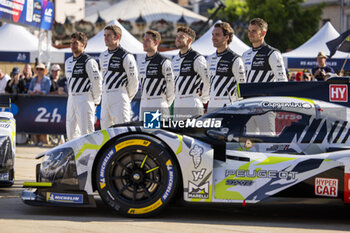 2024-06-07 - 93 VERGNE Jean-Eric (fra), JENSEN Mikkel (dnk), MULLER Nico (swi), Peugeot TotalEnergies, Peugeot 9x8 #93, Hypercar, FIA WEC, 94 VANDOORNE Stoffel (bel), DUVAL Loïc (fra), DI RESTA Paul (gbr), Peugeot TotalEnergies, Peugeot 9x8 #94, Hypercar, FIA WEC, portrait during the Scrutineering of the 2024 24 Hours of Le Mans, 4th round of the 2024 FIA World Endurance Championship, on the Place de la République, from June 7 to 8, 2024 in Le Mans, France - 24 HEURES DU MANS 2024 - SCRUTINEERING - ENDURANCE - MOTORS