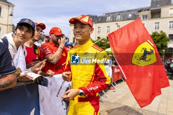 2024-06-08 - YE Yifei (chn), AF Corse, Ferrari 499P #83, Hypercar, FIA WEC, portrait during the Scrutineering of the 2024 24 Hours of Le Mans, 4th round of the 2024 FIA World Endurance Championship, on the Place de la République, from June 7 to 8, 2024 in Le Mans, France - 24 HEURES DU MANS 2024 - SCRUTINEERING - ENDURANCE - MOTORS