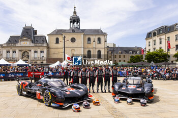 2024-06-08 - 07 LOPEZ José María (arg), KOBAYASHI Kamui (jpn), DE VRIES Nyck (nld), Toyota Gazoo Racing, Toyota GR010 - Hybrid #07, Hypercar, FIA WEC, 08 BUEMI Sébastien (swi), HARTLEY Brendon (nzl), HIRAKAWA Ryo (jpn), Toyota Gazoo Racing, Toyota GR010 - Hybrid #08, Hypercar, FIA WEC, portrait during the Scrutineering of the 2024 24 Hours of Le Mans, 4th round of the 2024 FIA World Endurance Championship, on the Place de la République, from June 7 to 8, 2024 in Le Mans, France - 24 HEURES DU MANS 2024 - SCRUTINEERING - ENDURANCE - MOTORS