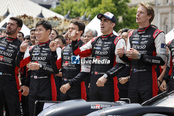 2024-06-08 - 07 LOPEZ José María (arg), KOBAYASHI Kamui (jpn), DE VRIES Nyck (nld), Toyota Gazoo Racing, Toyota GR010 - Hybrid #07, Hypercar, FIA WEC, action 08 BUEMI Sébastien (swi), HARTLEY Brendon (nzl), HIRAKAWA Ryo (jpn), Toyota Gazoo Racing, Toyota GR010 - Hybrid #08, Hypercar, FIA WEC, ambiance during the Scrutineering of the 2024 24 Hours of Le Mans, 4th round of the 2024 FIA World Endurance Championship, on the Place de la République, from June 7 to 8, 2024 in Le Mans, France - 24 HEURES DU MANS 2024 - SCRUTINEERING - ENDURANCE - MOTORS