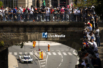 2024-06-08 - 94 VANDOORNE Stoffel (bel), DUVAL Loïc (fra), DI RESTA Paul (gbr), Peugeot TotalEnergies, Peugeot 9x8 #94, Hypercar, FIA WEC, action during the City Centre Procession of the 2024 24 Hours of Le Mans, 4th round of the 2024 FIA World Endurance Championship, on June 8, 2024 in Le Mans, France - 24 HEURES DU MANS 2024 - CITY CENTRE PROCESSION - ENDURANCE - MOTORS