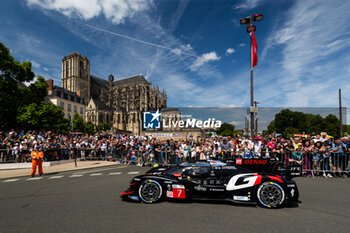 2024-06-08 - 07 LOPEZ José María (arg), KOBAYASHI Kamui (jpn), DE VRIES Nyck (nld), Toyota Gazoo Racing, Toyota GR010 - Hybrid #07, Hypercar, FIA WEC, action during the City Centre Procession of the 2024 24 Hours of Le Mans, 4th round of the 2024 FIA World Endurance Championship, on June 8, 2024 in Le Mans, France - 24 HEURES DU MANS 2024 - CITY CENTRE PROCESSION - ENDURANCE - MOTORS