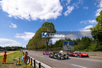 2024-06-09 - 09 RIED Jonas (ger), CAPIETTO Maceo (fra), VISCAAL Bent (nld), Proton Competition, Oreca 07 - Gibson #09, LMP2, 311 DERANI Luis Felipe (bra), AITKEN Jack (gbr), DRUGOVICH Felipe (bra), Whelen Cadillac Racing, Cadillac V-Series.R #311, Hypercar, 14 HYETT PJ (usa), DELETRAZ Louis (swi), QUINN Alex (gbr), AO by TF, Oreca 07 - Gibson #14, LMP2 PRO/AM, action during the Free Practice 2 - Test Day of the 2024 24 Hours of Le Mans, 4th round of the 2024 FIA World Endurance Championship, on the Circuit des 24 Heures du Mans, on June 9, 2024 in Le Mans, France - 24 HEURES DU MANS 2024 - FREE PRACTICE 2 - TEST DAY - ENDURANCE - MOTORS