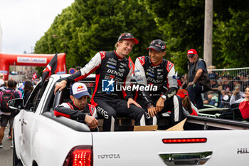 2024-06-14 - HIRAKAWA Ryo (jpn), Toyota Gazoo Racing, Toyota GR010 - Hybrid #08, Hypercar, FIA WEC, portrait, HARTLEY Brendon (nzl), Toyota Gazoo Racing, Toyota GR010 - Hybrid #08, Hypercar, FIA WEC, portrait during the Grande Parade des Pilotes of the 2024 24 Hours of Le Mans, 4th round of the 2024 FIA World Endurance Championship, on the Circuit des 24 Heures du Mans, on June 14, 2024 in Le Mans, France - 24 HEURES DU MANS 2024 - PARADE - ENDURANCE - MOTORS