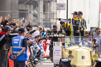 2024-06-14 - 65 SALES Rodrigo (usa), BECHE Mathias (swi), HUFFAKER Scott (usa), Panis Racing, Oreca 07 - Gibson #65, LMP2 PRO/AM, ambiance during the Grande Parade des Pilotes of the 2024 24 Hours of Le Mans, 4th round of the 2024 FIA World Endurance Championship, on the Circuit des 24 Heures du Mans, on June 14, 2024 in Le Mans, France - 24 HEURES DU MANS 2024 - PARADE - ENDURANCE - MOTORS