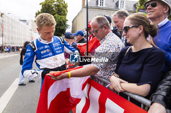 2024-06-14 - JAKOBSEN Malthe (dnk), New Peugeot Reserve Driver, portrait during the Grande Parade des Pilotes of the 2024 24 Hours of Le Mans, 4th round of the 2024 FIA World Endurance Championship, on the Circuit des 24 Heures du Mans, on June 14, 2024 in Le Mans, France - 24 HEURES DU MANS 2024 - PARADE - ENDURANCE - MOTORS