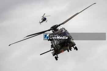 2024-06-15 - Arrival of the national flag by helicopter during the pre-race of the 2024 24 Hours of Le Mans, 4th round of the 2024 FIA World Endurance Championship, on the Circuit des 24 Heures du Mans, on June 15, 2024 in Le Mans, France - 24 HEURES DU MANS 2024 - PRE-RACE - ENDURANCE - MOTORS