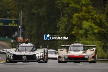 2024-06-15 - 93 VERGNE Jean-Eric (fra), JENSEN Mikkel (dnk), MULLER Nico (swi), Peugeot TotalEnergies, Peugeot 9x8 #93, Hypercar, FIA WEC, 38 RASMUSSEN Oliver (dnk), HANSON Philip (gbr), BUTTON Jenson (gbr), Hertz Team Jota, Porsche 963 #38, Hypercar, FIA WEC, action action during the 2024 24 Hours of Le Mans, 4th round of the 2024 FIA World Endurance Championship, on the Circuit des 24 Heures du Mans, from June 15 to 16, 2024 in Le Mans, France - 24 HEURES DU MANS 2024 - RACE - ENDURANCE - MOTORS