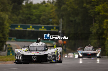 2024-06-15 - 94 VANDOORNE Stoffel (bel), DUVAL Loïc (fra), DI RESTA Paul (gbr), Peugeot TotalEnergies, Peugeot 9x8 #94, Hypercar, FIA WEC, action during the 2024 24 Hours of Le Mans, 4th round of the 2024 FIA World Endurance Championship, on the Circuit des 24 Heures du Mans, from June 15 to 16, 2024 in Le Mans, France - 24 HEURES DU MANS 2024 - RACE - ENDURANCE - MOTORS