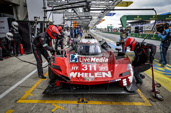 2024-06-16 - pitlane, pitstop, arrêt aux stands reparation 311 DERANI Luis Felipe (bra), AITKEN Jack (gbr), DRUGOVICH Felipe (bra), Whelen Cadillac Racing, Cadillac V-Series.R #311, Hypercar, during the 2024 24 Hours of Le Mans, 4th round of the 2024 FIA World Endurance Championship, on the Circuit des 24 Heures du Mans, from June 15 to 16, 2024 in Le Mans, France - 24 HEURES DU MANS 2024 - RACE - ENDURANCE - MOTORS