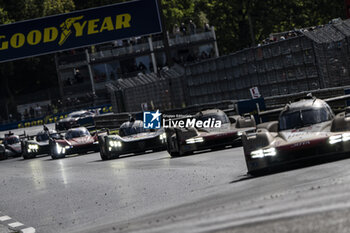 2024-06-16 - 38 RASMUSSEN Oliver (dnk), HANSON Philip (gbr), BUTTON Jenson (gbr), Hertz Team Jota, Porsche 963 #38, Hypercar, FIA WEC, 12 STEVENS Will (gbr), ILOTT Callum (gbr), NATO Norman (fra), Hertz Team Jota, Porsche 963 #12, Hypercar, FIA WEC, 94 VANDOORNE Stoffel (bel), DUVAL Loïc (fra), DI RESTA Paul (gbr), Peugeot TotalEnergies, Peugeot 9x8 #94, Hypercar, FIA WEC, action during the 2024 24 Hours of Le Mans, 4th round of the 2024 FIA World Endurance Championship, on the Circuit des 24 Heures du Mans, from June 15 to 16, 2024 in Le Mans, France - 24 HEURES DU MANS 2024 - RACE - ENDURANCE - MOTORS