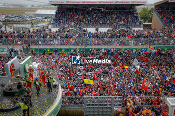 2024-06-16 - podium, portrait ambiance pitlane, 50 FUOCO Antonio (ita), MOLINA Miguel (spa), NIELSEN Nicklas (dnk), Ferrari AF Corse, Ferrari 499P #50, Hypercar, FIA WEC, portrait, 07 LOPEZ José María (arg), KOBAYASHI Kamui (jpn), DE VRIES Nyck (nld), Toyota Gazoo Racing, Toyota GR010 - Hybrid #07, Hypercar, FIA WEC, 51 PIER GUIDI Alessandro (ita), CALADO James (gbr), GIOVINAZZI Antonio (ita), Ferrari AF Corse, Ferrari 499P #51, Hypercar, FIA WEC, during the 2024 24 Hours of Le Mans, 4th round of the 2024 FIA World Endurance Championship, on the Circuit des 24 Heures du Mans, from June 15 to 16, 2024 in Le Mans, France - 24 HEURES DU MANS 2024 - RACE - ENDURANCE - MOTORS