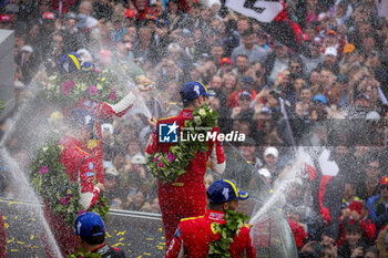 2024-06-16 - podium, portrait ambiance pitlane, 50 FUOCO Antonio (ita), MOLINA Miguel (spa), NIELSEN Nicklas (dnk), Ferrari AF Corse, Ferrari 499P #50, Hypercar, FIA WEC, portrait, during the 2024 24 Hours of Le Mans, 4th round of the 2024 FIA World Endurance Championship, on the Circuit des 24 Heures du Mans, from June 15 to 16, 2024 in Le Mans, France - 24 HEURES DU MANS 2024 - RACE - ENDURANCE - MOTORS