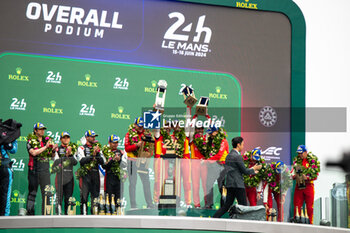 2024-06-16 - Podium, 50 FUOCO Antonio (ita), MOLINA Miguel (spa), NIELSEN Nicklas (dnk), Ferrari AF Corse, Ferrari 499P #50, Hypercar, FIA WEC, 07 CONWAY Mike (gbr), KOBAYASHI Kamui (jpn), DE VRIES Nyck (nld), Toyota Gazoo Racing, Toyota GR010 - Hybrid #07, Hypercar, FIA WEC, 51 PIER GUIDI Alessandro (ita), CALADO James (gbr), GIOVINAZZI Antonio (ita), Ferrari AF Corse, Ferrari 499P #51, Hypercar, FIA WEC, action during the podium of the 2024 24 Hours of Le Mans, 4th round of the 2024 FIA World Endurance Championship, on the Circuit des 24 Heures du Mans, from June 15 to 16, 2024 in Le Mans, France - 24 HEURES DU MANS 2024 - PODIUM - ENDURANCE - MOTORS