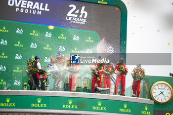 2024-06-16 - Podium, 50 FUOCO Antonio (ita), MOLINA Miguel (spa), NIELSEN Nicklas (dnk), Ferrari AF Corse, Ferrari 499P #50, Hypercar, FIA WEC, 07 CONWAY Mike (gbr), KOBAYASHI Kamui (jpn), DE VRIES Nyck (nld), Toyota Gazoo Racing, Toyota GR010 - Hybrid #07, Hypercar, FIA WEC, 51 PIER GUIDI Alessandro (ita), CALADO James (gbr), GIOVINAZZI Antonio (ita), Ferrari AF Corse, Ferrari 499P #51, Hypercar, FIA WEC, action during the podium of the 2024 24 Hours of Le Mans, 4th round of the 2024 FIA World Endurance Championship, on the Circuit des 24 Heures du Mans, from June 15 to 16, 2024 in Le Mans, France - 24 HEURES DU MANS 2024 - PODIUM - ENDURANCE - MOTORS