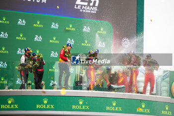 2024-06-16 - Podium, 50 FUOCO Antonio (ita), MOLINA Miguel (spa), NIELSEN Nicklas (dnk), Ferrari AF Corse, Ferrari 499P #50, Hypercar, FIA WEC, 07 CONWAY Mike (gbr), KOBAYASHI Kamui (jpn), DE VRIES Nyck (nld), Toyota Gazoo Racing, Toyota GR010 - Hybrid #07, Hypercar, FIA WEC, 51 PIER GUIDI Alessandro (ita), CALADO James (gbr), GIOVINAZZI Antonio (ita), Ferrari AF Corse, Ferrari 499P #51, Hypercar, FIA WEC, action during the podium of the 2024 24 Hours of Le Mans, 4th round of the 2024 FIA World Endurance Championship, on the Circuit des 24 Heures du Mans, from June 15 to 16, 2024 in Le Mans, France - 24 HEURES DU MANS 2024 - PODIUM - ENDURANCE - MOTORS