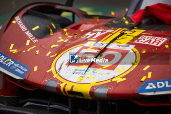 2024-06-16 - 50 FUOCO Antonio (ita), MOLINA Miguel (spa), NIELSEN Nicklas (dnk), Ferrari AF Corse, Ferrari 499P #50, Hypercar, FIA WEC, detail, dirt during the podium of the 2024 24 Hours of Le Mans, 4th round of the 2024 FIA World Endurance Championship, on the Circuit des 24 Heures du Mans, from June 15 to 16, 2024 in Le Mans, France - 24 HEURES DU MANS 2024 - PODIUM - ENDURANCE - MOTORS