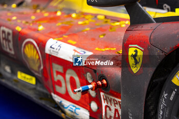 2024-06-16 - 50 FUOCO Antonio (ita), MOLINA Miguel (spa), NIELSEN Nicklas (dnk), Ferrari AF Corse, Ferrari 499P #50, Hypercar, FIA WEC, detail, dirt during the podium of the 2024 24 Hours of Le Mans, 4th round of the 2024 FIA World Endurance Championship, on the Circuit des 24 Heures du Mans, from June 15 to 16, 2024 in Le Mans, France - 24 HEURES DU MANS 2024 - PODIUM - ENDURANCE - MOTORS