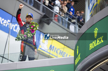 2024-06-16 - DE VRIES Nyck (nld), Toyota Gazoo Racing, Toyota GR010 - Hybrid #07, Hypercar, FIA WEC, portrait during the podium of the 2024 24 Hours of Le Mans, 4th round of the 2024 FIA World Endurance Championship, on the Circuit des 24 Heures du Mans, from June 15 to 16, 2024 in Le Mans, France - 24 HEURES DU MANS 2024 - PODIUM - ENDURANCE - MOTORS