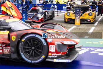 2024-06-16 - 91 LIETZ Richard (aut), SCHURING Morris (nld), SHAHIN Yasser (aus), Manthey EMA, Porsche 911 GT3 R #91, LM GT3, FIA WEC, action celebrating their win during the podium of the 2024 24 Hours of Le Mans, 4th round of the 2024 FIA World Endurance Championship, on the Circuit des 24 Heures du Mans, from June 15 to 16, 2024 in Le Mans, France - 24 HEURES DU MANS 2024 - PODIUM - ENDURANCE - MOTORS