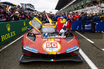 2024-06-16 - 50 FUOCO Antonio (ita), MOLINA Miguel (spa), NIELSEN Nicklas (dnk), Ferrari AF Corse, Ferrari 499P #50, Hypercar, FIA WEC, celebrating their win during the podium of the 2024 24 Hours of Le Mans, 4th round of the 2024 FIA World Endurance Championship, on the Circuit des 24 Heures du Mans, from June 15 to 16, 2024 in Le Mans, France - 24 HEURES DU MANS 2024 - PODIUM - ENDURANCE - MOTORS