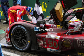 2024-06-16 - MOLINA Miguel (spa), Ferrari AF Corse, Ferrari 499P #50, Hypercar, FIA WEC, portrait, kissing the car on parc ferme during the podium of the 2024 24 Hours of Le Mans, 4th round of the 2024 FIA World Endurance Championship, on the Circuit des 24 Heures du Mans, from June 15 to 16, 2024 in Le Mans, France - 24 HEURES DU MANS 2024 - PODIUM - ENDURANCE - MOTORS