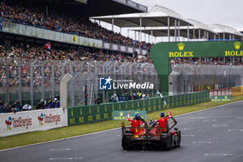 2024-06-16 - 50 FUOCO Antonio (ita), MOLINA Miguel (spa), NIELSEN Nicklas (dnk), Ferrari AF Corse, Ferrari 499P #50, Hypercar, FIA WEC, celebrating their win during the podium of the 2024 24 Hours of Le Mans, 4th round of the 2024 FIA World Endurance Championship, on the Circuit des 24 Heures du Mans, from June 15 to 16, 2024 in Le Mans, France - 24 HEURES DU MANS 2024 - PODIUM - ENDURANCE - MOTORS