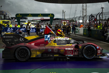 2024-06-16 - 51 PIER GUIDI Alessandro (ita), CALADO James (gbr), GIOVINAZZI Antonio (ita), Ferrari AF Corse, Ferrari 499P #51, Hypercar, FIA WEC, illustration post race on parc ferme during the podium of the 2024 24 Hours of Le Mans, 4th round of the 2024 FIA World Endurance Championship, on the Circuit des 24 Heures du Mans, from June 15 to 16, 2024 in Le Mans, France - 24 HEURES DU MANS 2024 - PODIUM - ENDURANCE - MOTORS