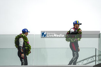 2024-06-16 - LOPEZ José María (arg), KOBAYASHI Kamui (jpn), DE VRIES Nyck (nld), Toyota Gazoo Racing, Toyota GR010 - Hybrid #07, Hypercar, FIA WEC, portrait, podium during the podium of the 2024 24 Hours of Le Mans, 4th round of the 2024 FIA World Endurance Championship, on the Circuit des 24 Heures du Mans, from June 15 to 16, 2024 in Le Mans, France - 24 HEURES DU MANS 2024 - PODIUM - ENDURANCE - MOTORS