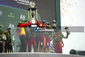 2024-06-16 - FUOCO Antonio (ita), MOLINA Miguel (spa), NIELSEN Nicklas (dnk), Ferrari AF Corse, Ferrari 499P #50, Hypercar, FIA WEC, celebrate with the trophy on podium during of the 2024 24 Hours of Le Mans, 4th round of the 2024 FIA World Endurance Championship, on the Circuit des 24 Heures du Mans, from June 15 to 16, 2024 in Le Mans, France - 24 HEURES DU MANS 2024 - PODIUM - ENDURANCE - MOTORS