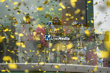 2024-06-16 - FUOCO Antonio (ita), MOLINA Miguel (spa), NIELSEN Nicklas (dnk), Ferrari AF Corse, Ferrari 499P #50, Hypercar, FIA WEC, celebrate with the trophy on podium during of the 2024 24 Hours of Le Mans, 4th round of the 2024 FIA World Endurance Championship, on the Circuit des 24 Heures du Mans, from June 15 to 16, 2024 in Le Mans, France - 24 HEURES DU MANS 2024 - PODIUM - ENDURANCE - MOTORS