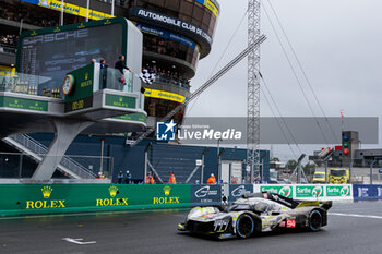 2024-06-16 - Finish line, arrivee of 94 VANDOORNE Stoffel (bel), DUVAL Loïc (fra), DI RESTA Paul (gbr), Peugeot TotalEnergies, Peugeot 9x8 #94, Hypercar, FIA WEC, action during the podium of the 2024 24 Hours of Le Mans, 4th round of the 2024 FIA World Endurance Championship, on the Circuit des 24 Heures du Mans, from June 15 to 16, 2024 in Le Mans, France - 24 HEURES DU MANS 2024 - PODIUM - ENDURANCE - MOTORS