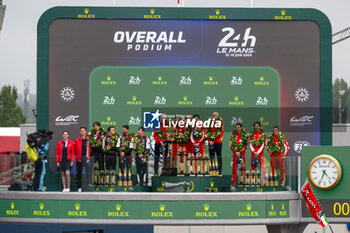 2024-06-16 - Overall podium during the podium of the 2024 24 Hours of Le Mans, 4th round of the 2024 FIA World Endurance Championship, on the Circuit des 24 Heures du Mans, from June 15 to 16, 2024 in Le Mans, France - 24 HEURES DU MANS 2024 - PODIUM - ENDURANCE - MOTORS