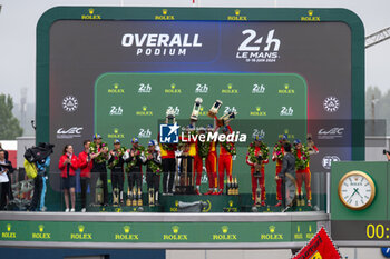 2024-06-16 - Overall podium during the podium of the 2024 24 Hours of Le Mans, 4th round of the 2024 FIA World Endurance Championship, on the Circuit des 24 Heures du Mans, from June 15 to 16, 2024 in Le Mans, France - 24 HEURES DU MANS 2024 - PODIUM - ENDURANCE - MOTORS