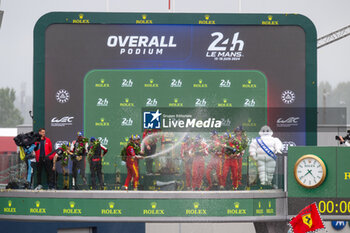 2024-06-16 - Overall podium during the podium of the 2024 24 Hours of Le Mans, 4th round of the 2024 FIA World Endurance Championship, on the Circuit des 24 Heures du Mans, from June 15 to 16, 2024 in Le Mans, France - 24 HEURES DU MANS 2024 - PODIUM - ENDURANCE - MOTORS